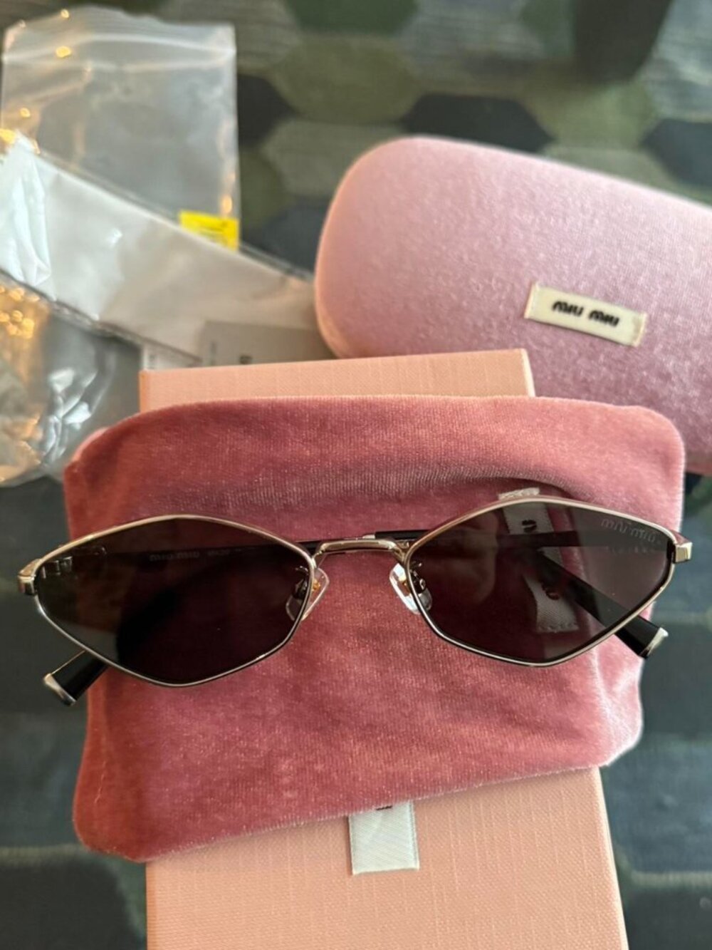 Miu Miu Women's Black and Gold Sunglasses